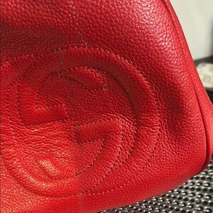 Gucci Red Shoulder Bag with Embossed Leather Design